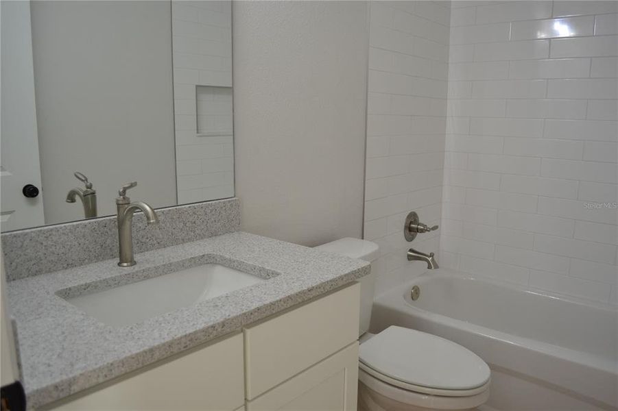 Furnished interior view inside a new home in , Dunnellon (Image 5).