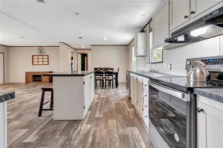 Furnished interior view inside a new home in , Weirsdale (Image 4).