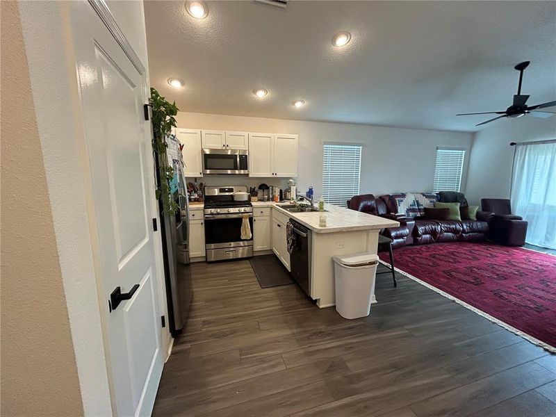 Furnished interior view inside a new home in , Okahumpka (Image 7).