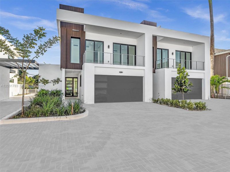 Front exterior of a new home in , Dania Beach, FL, highlighting curb appeal (Image 38).