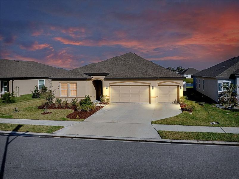 Front exterior of a new home in , Bradenton, FL, highlighting curb appeal (Image 25).