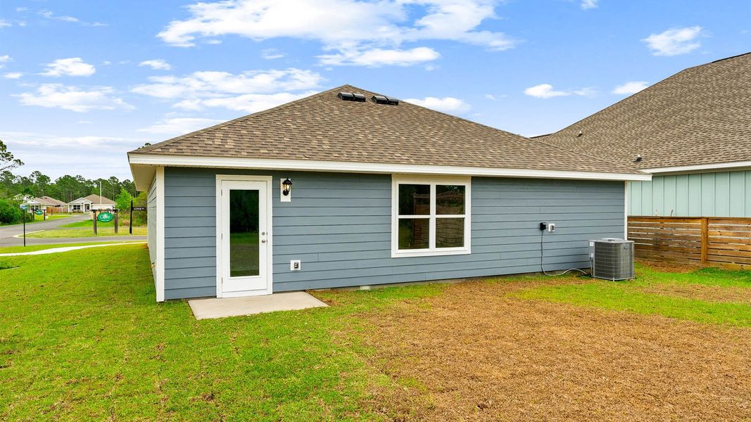 Exterior details and patio area of a home in Palmetto Bluff, Port Saint Joe (Image 17).
