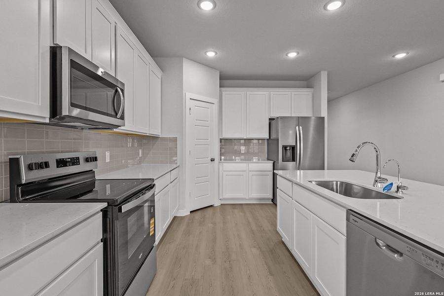 Furnished interior view inside a new home in Cinco Lakes, San Antonio (Image 14).