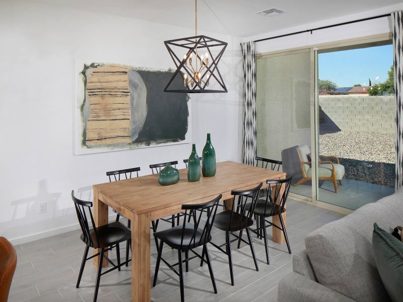 Dining Room in the Leslie Floorplan modeled at Camino Crossing