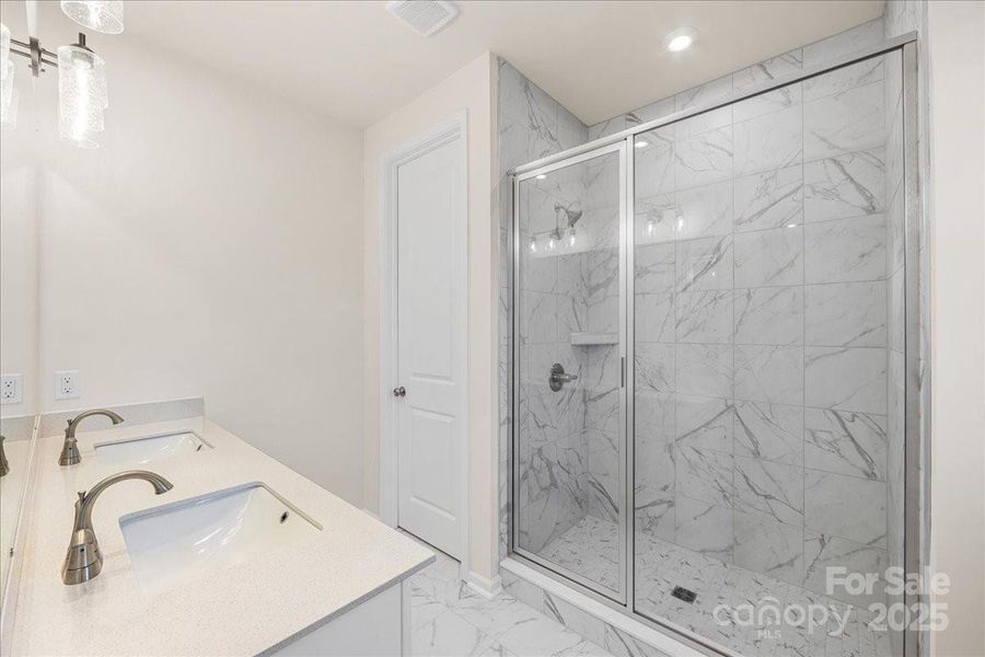 Tiled Walk-In Primary Shower.