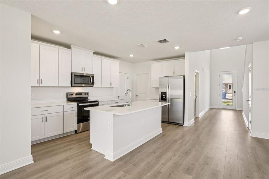 Furnished interior view inside a new home in The Reserve at Hammock Oaks - Classic Series, Lady Lake (Image 5).