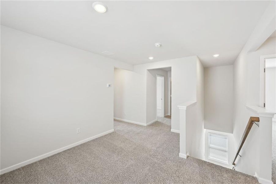 Spacious, unfurnished interior of a new home in Hawthorne Station, College Park (Image 33).