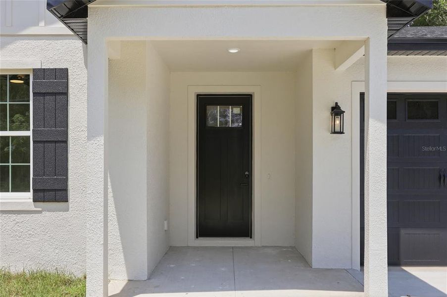 Exterior details and patio area of a home in , Summerfield (Image 19).
