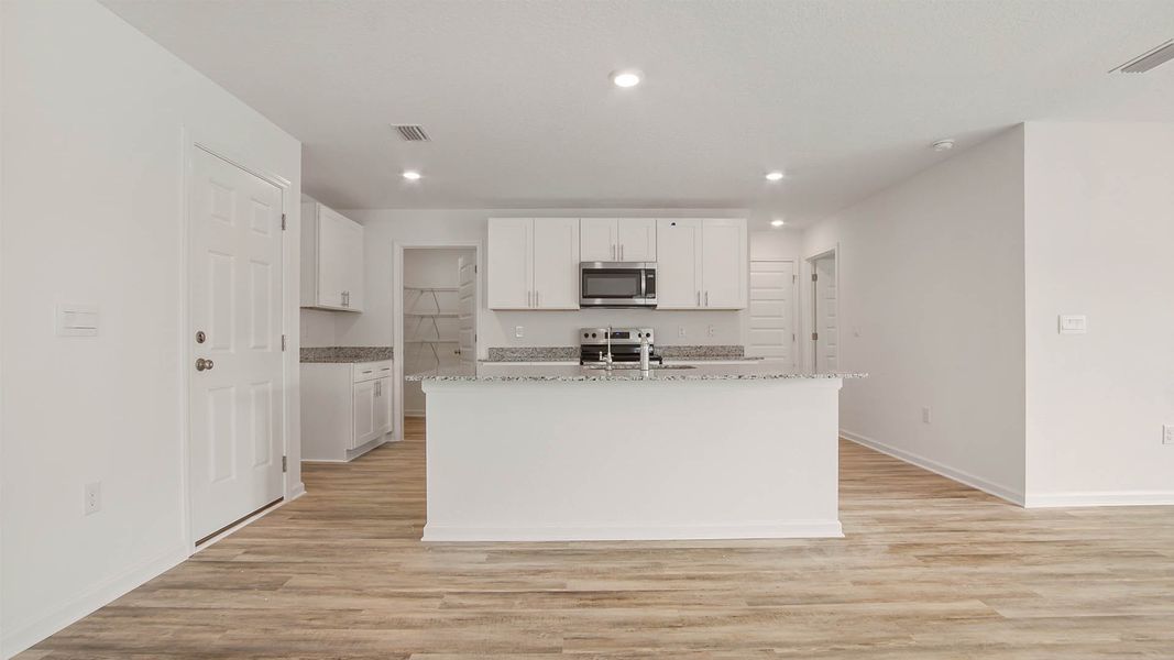 Image 5 representing the Robie by D.R. Horton in Riverwalk, Freeport, FL.