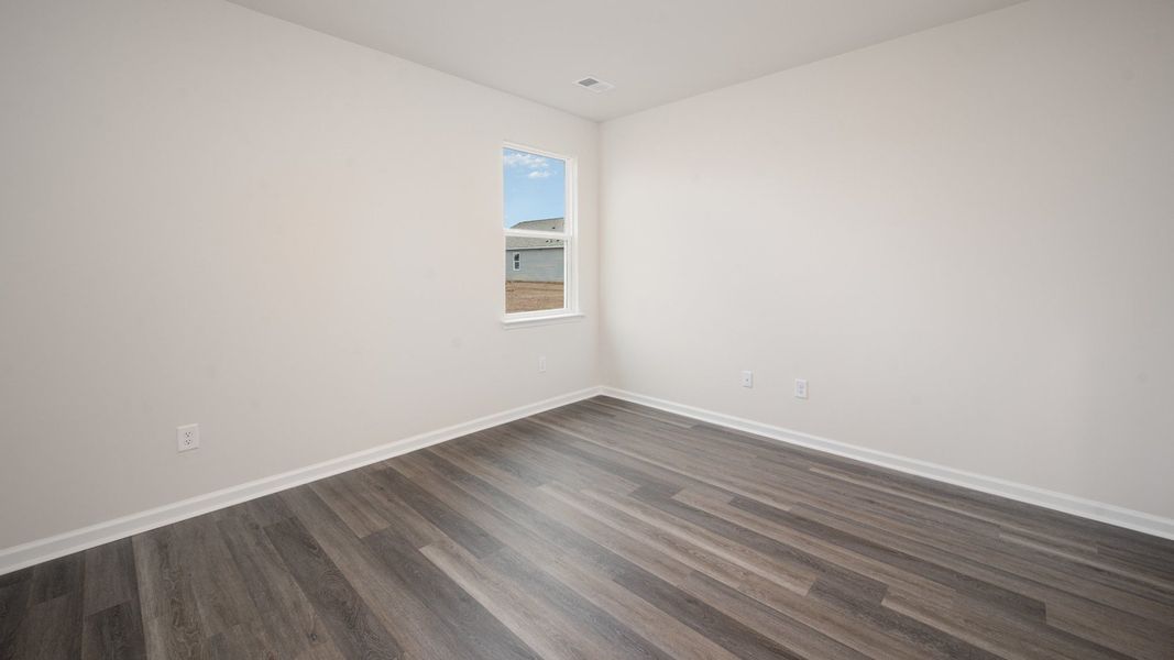 Representative unfurnished interior of a home built from the WREN by D.R. Horton in Sidbury Station, Castle Hayne (Image 15).