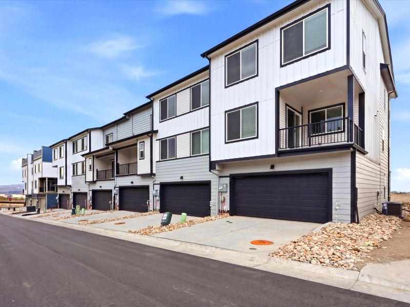 Front exterior of a new home in Three Hills, Morrison, CO, highlighting curb appeal (Image 1). Front exterior of a new home in Three Hills, Morrison, CO, highlighting curb appeal (Image 1).