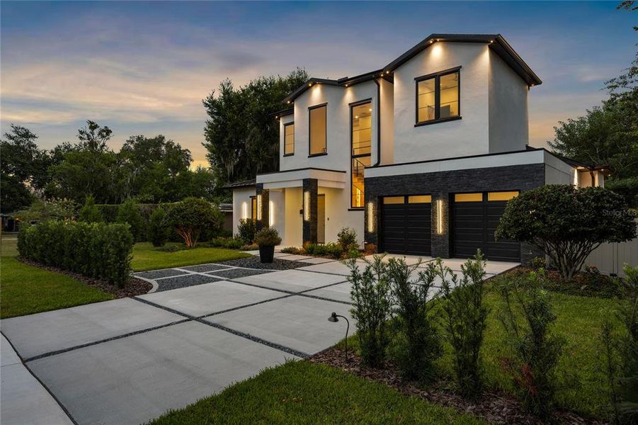 Front exterior of a new home in , Winter Park, FL, highlighting curb appeal (Image 27). Front exterior of a new home in , Winter Park, FL, highlighting curb appeal (Image 27).