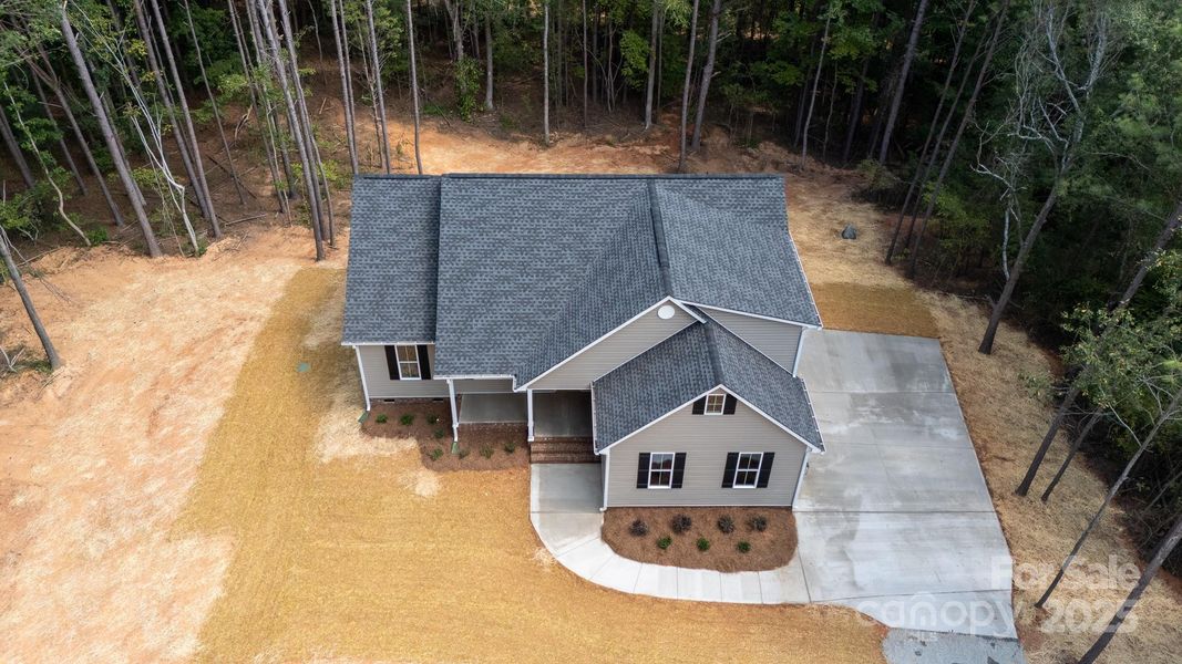 Front exterior of a new home in , Chester, SC, highlighting curb appeal (Image 17).