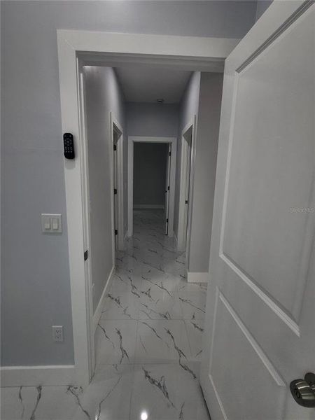 Spacious, unfurnished interior of a new home in , Port Charlotte (Image 27).