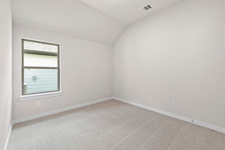 Representative unfurnished interior of a home built from the Nueces by Trophy Signature Homes in Prairie Winds, Hutto (Image 26).