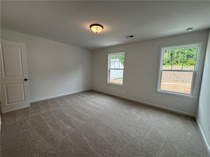 Spacious, unfurnished interior of a new home in Arbors at Richland Creek, Buford (Image 21).