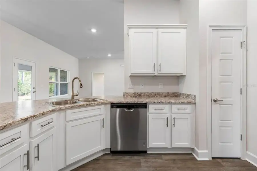 Representative furnished interior of a home built from the 2265 by Adams Homes in Flagler Estates, Hastings (Image 9).