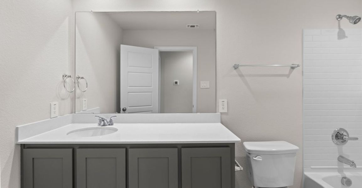 Representative exterior photo of a completed home built from the Willow by Impression Homes in Keeneland, Aubrey, TX (Image 20). Representative exterior photo of a completed home built from the Willow by Impression Homes in Keeneland, Aubrey, TX (Image 20).