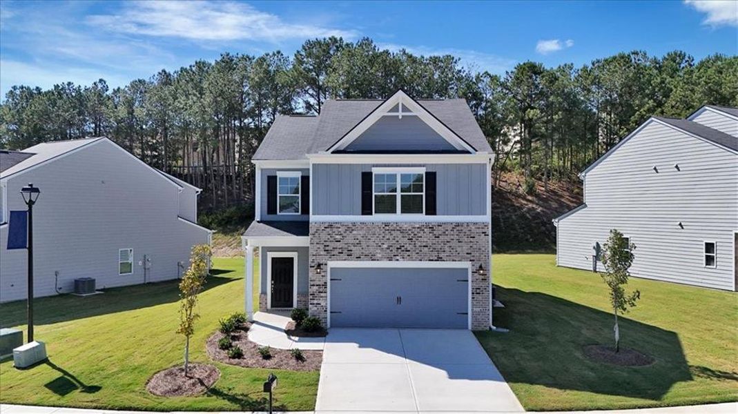 Front exterior of a new home in The View at Groover's Lake, Lithia Springs, GA, highlighting curb appeal (Image 18).