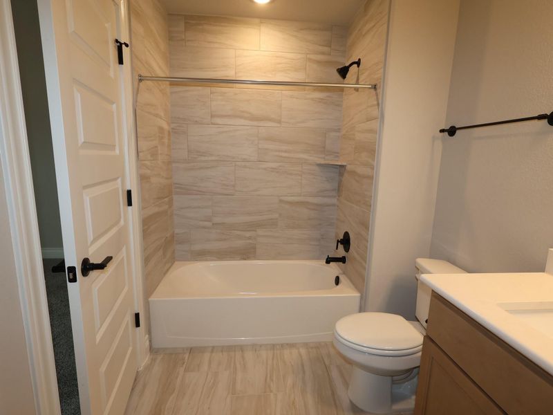 Furnished interior view inside a new home in Edgewood, Leander (Image 8). Furnished interior view inside a new home in Edgewood, Leander (Image 8).