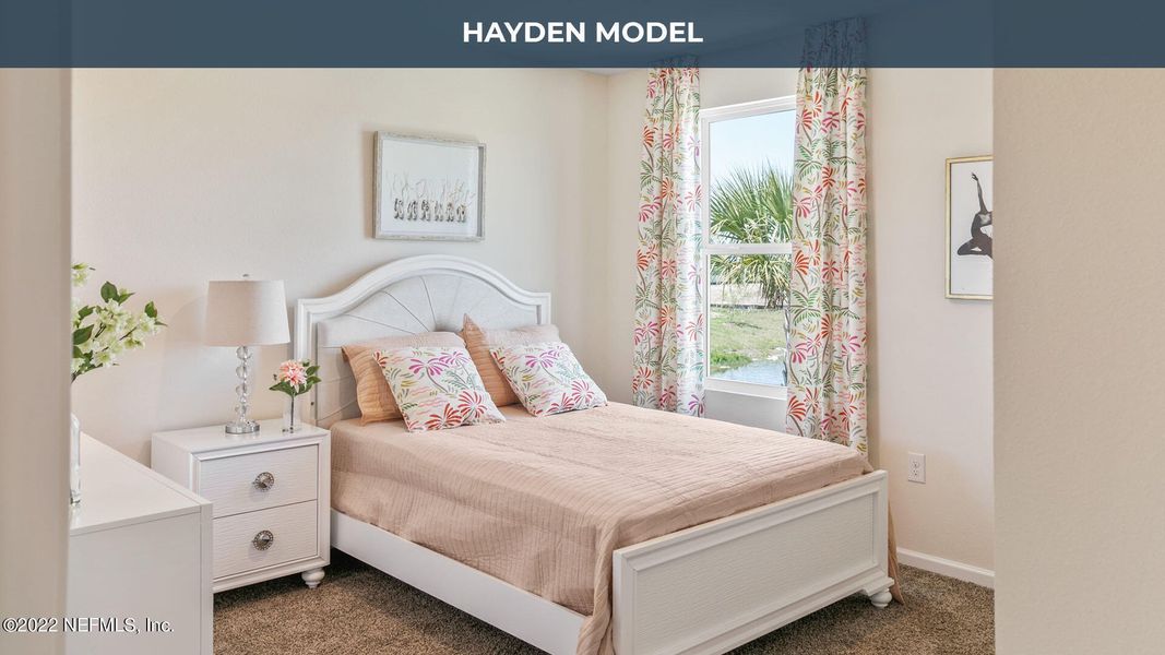 Furnished interior view inside a new home in Cross Creek Express, Green Cove Springs (Image 10).