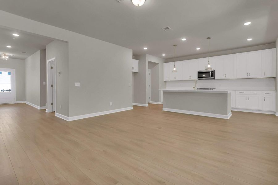 Living Room to Kitchen and Foyer