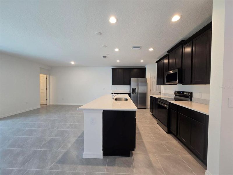 Furnished interior view inside a new home in Sky Lakes Estates, St. Cloud (Image 3).