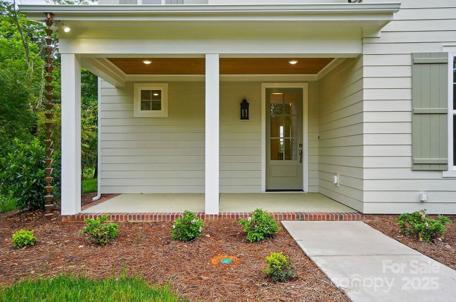 Front exterior of a new home in , Waxhaw, NC, highlighting curb appeal (Image 23). Front exterior of a new home in , Waxhaw, NC, highlighting curb appeal (Image 23).