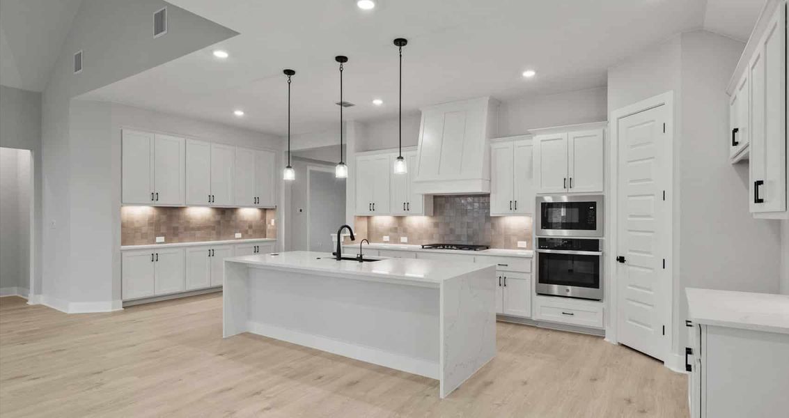 Furnished interior view inside a new home in 6 Creeks, Kyle (Image 4). Furnished interior view inside a new home in 6 Creeks, Kyle (Image 4).