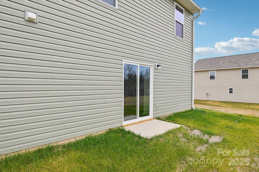 Exterior details and patio area of a home in The Pines at Stoney Point, Lexington (Image 8).