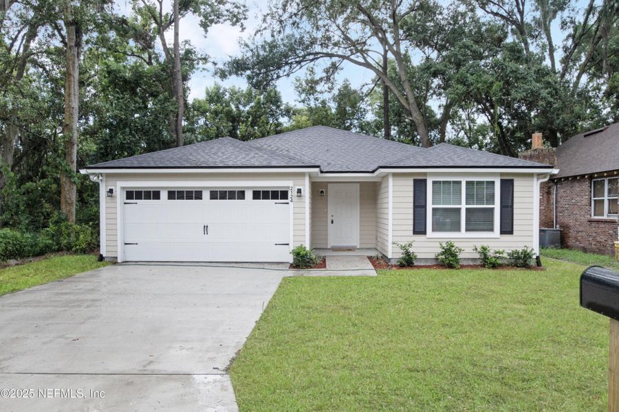 Front exterior of a new home in , Jacksonville, FL, highlighting curb appeal (Image 20).