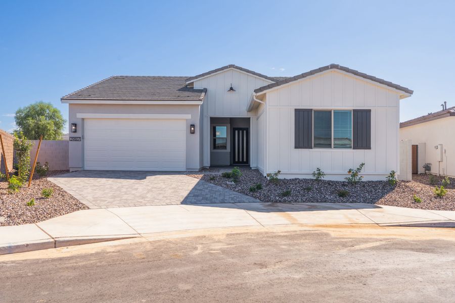 Front exterior of a new home in Terraza, San Tan Valley, AZ, highlighting curb appeal (Image 1). Front exterior of a new home in Terraza, San Tan Valley, AZ, highlighting curb appeal (Image 1).