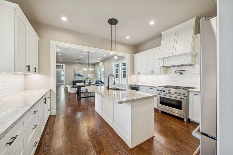 Island seating for up to 4. Stainless steel appliances throughout. Pot filler above the 36" gas range / electric oven! Island seating for up to 4. Stainless steel appliances throughout. Pot filler above the 36" gas range / electric oven!