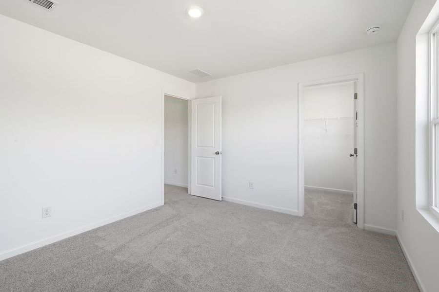 Spacious, unfurnished interior of a new home in Windance Lake, Loganville (Image 31).