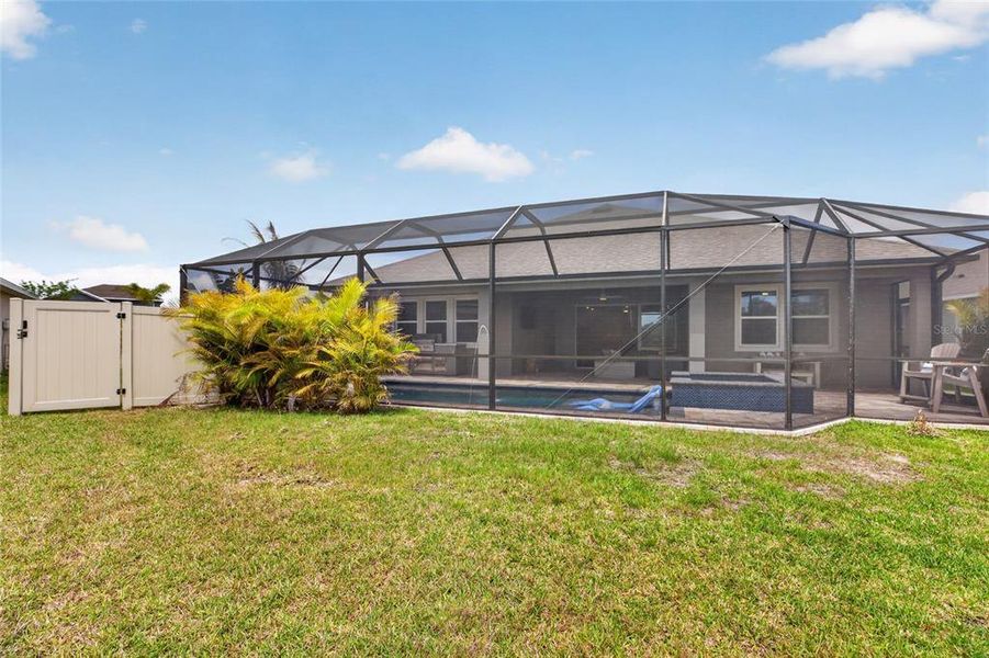 Exterior details and patio area of a home in Seaire, Parrish (Image 28).