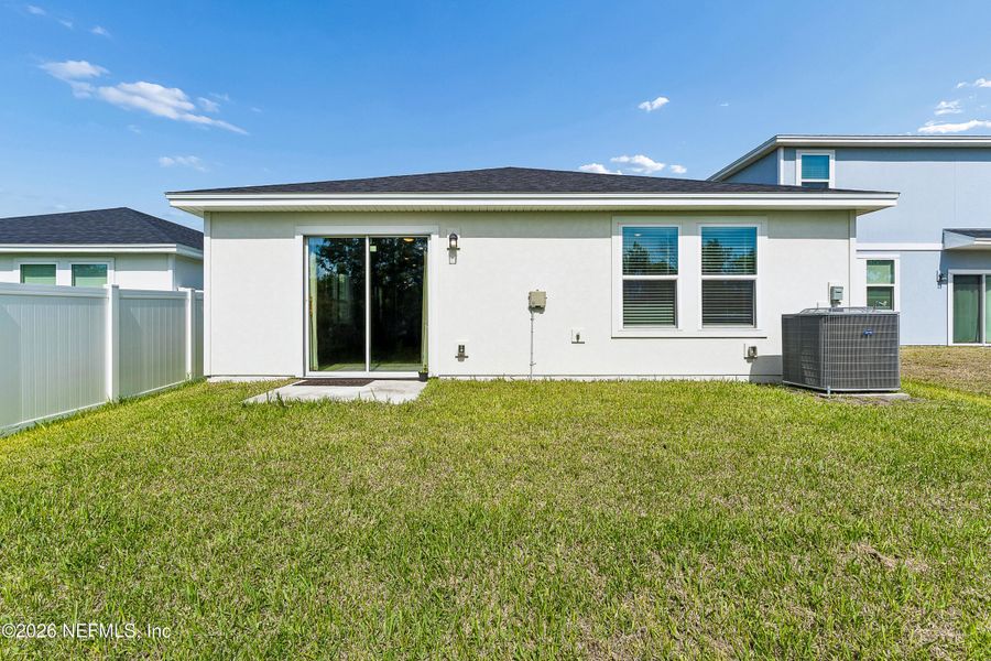Exterior details and patio area of a home in Lakes at Bella Lago – Classic Series, Green Cove Springs (Image 3).