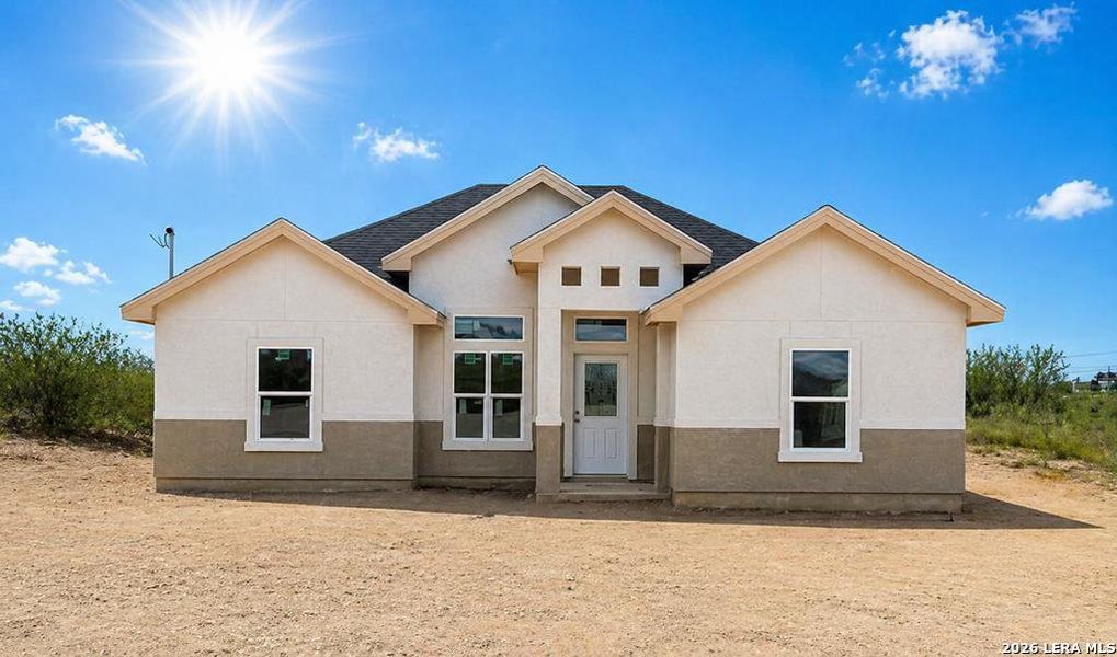 Front exterior of a new home in , Eagle Pass, TX, highlighting curb appeal (Image 13). Front exterior of a new home in , Eagle Pass, TX, highlighting curb appeal (Image 13).