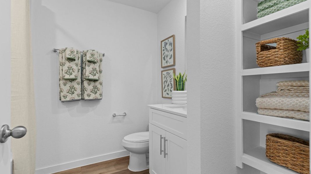 Furnished interior view inside a new home in Caldwell Crossing, Iowa Colony (Image 13).