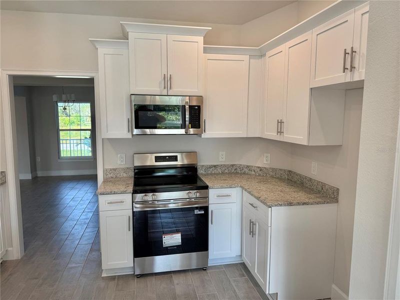 Furnished interior view inside a new home in , Port Charlotte (Image 7).
