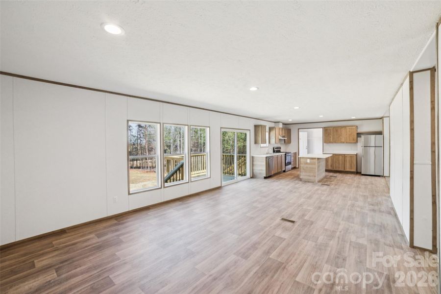 Spacious, unfurnished interior of a new home in , Vale (Image 12).