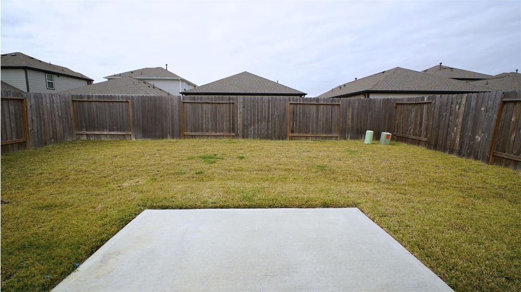 Exterior details and patio area of a home in Lonestar Collection at Aurora, Katy (Image 4).
