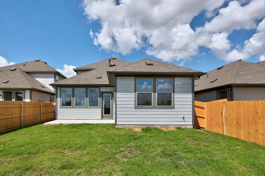 Exterior details and patio area of a home in Trinity Ranch, Elgin (Image 4).