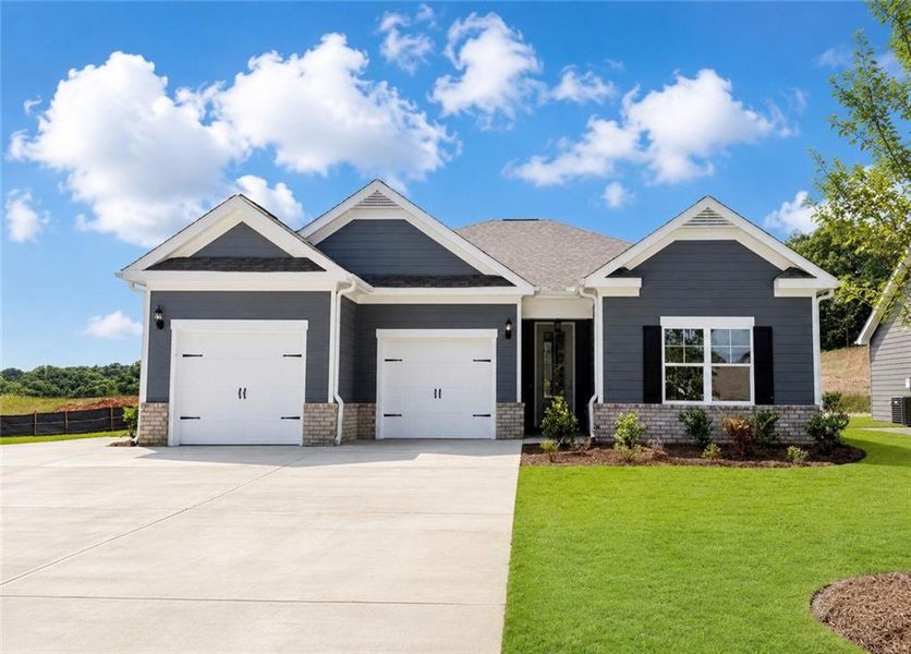 Front exterior of a new home in , Homer, GA, highlighting curb appeal (Image 1). Front exterior of a new home in , Homer, GA, highlighting curb appeal (Image 1).