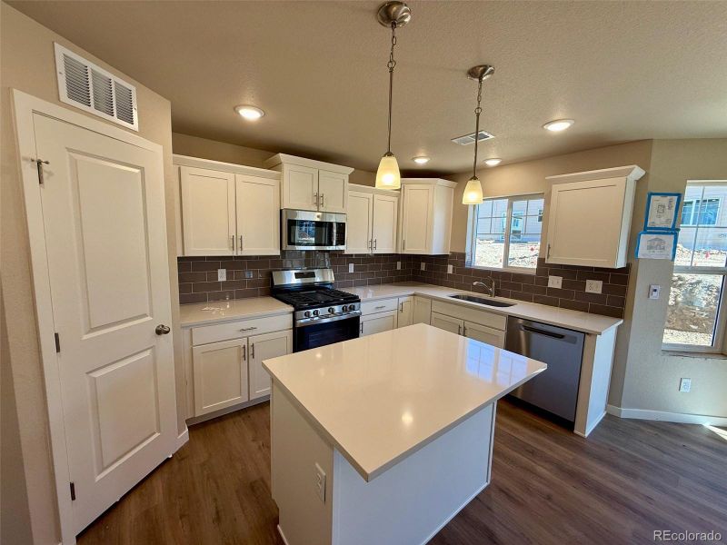 Furnished interior view inside a new home in Sky Ranch - Highland Collection, Watkins (Image 2). Furnished interior view inside a new home in Sky Ranch - Highland Collection, Watkins (Image 2).