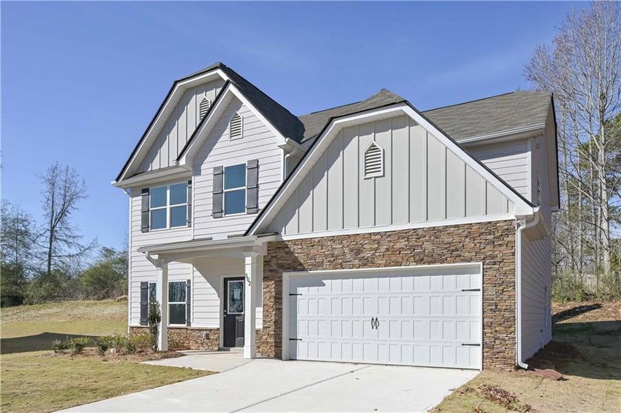 Front exterior of a new home in , Villa Rica, GA, highlighting curb appeal (Image 17).