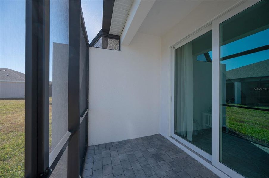 Exterior details and patio area of a home in , Englewood (Image 25).