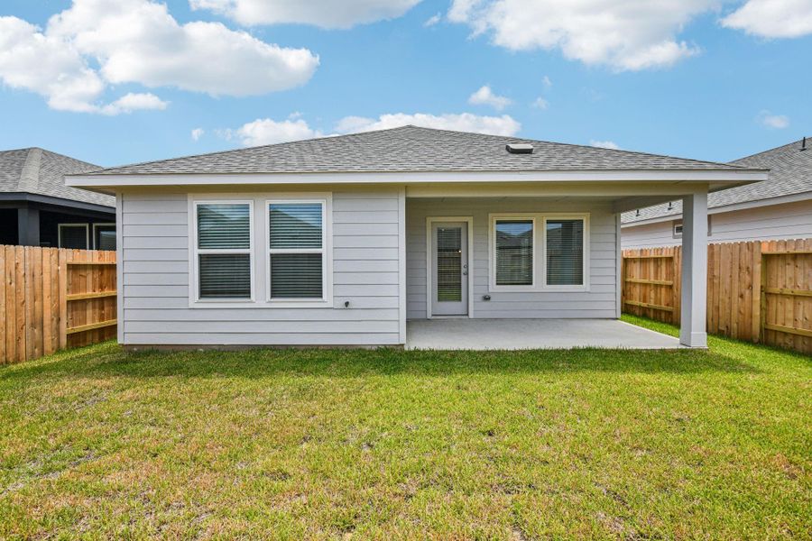 Front exterior of a new home in Mavera, Conroe, TX, highlighting curb appeal (Image 26). Front exterior of a new home in Mavera, Conroe, TX, highlighting curb appeal (Image 26).
