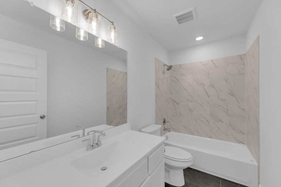 Furnished interior view inside a new home in Santa Rita Ranch - 60', Liberty Hill (Image 9). Furnished interior view inside a new home in Santa Rita Ranch - 60', Liberty Hill (Image 9).