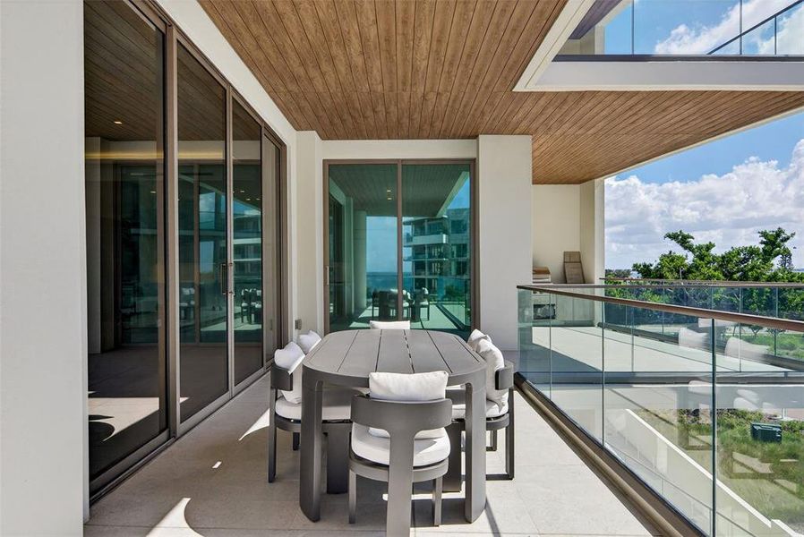 Exterior details and patio area of a home in , Longboat Key (Image 28).