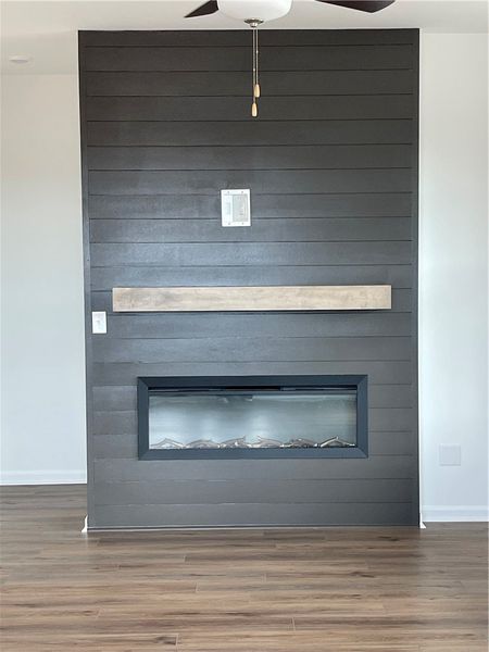 This living space features a captivating dark wood